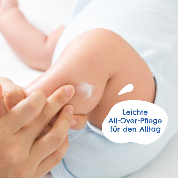 a baby's leg with cream on it