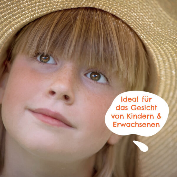 a girl wearing a straw hat