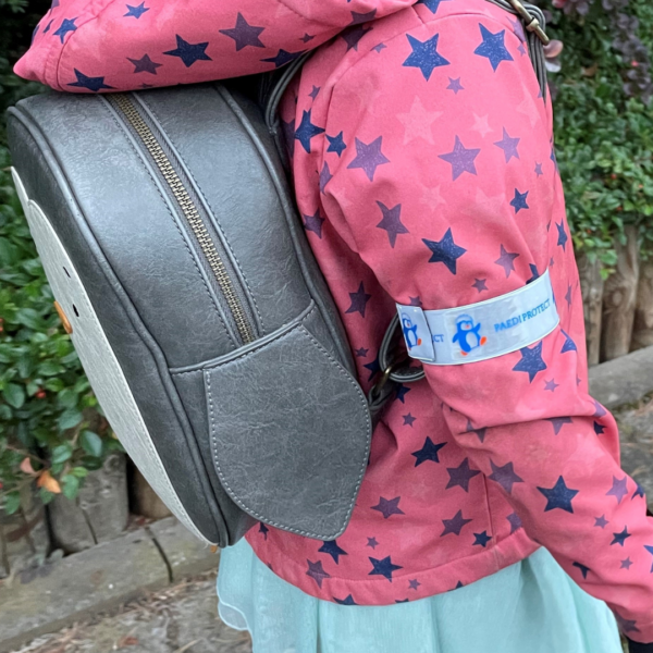 PAEDIPROTECT Schnapparmband am Arm